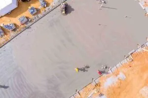 Concrete slab installation for residential driveway in Royse City, TX, showing smooth finished surface