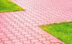 Stamped concrete patio with decorative pattern installed for a home in Royse City, TX